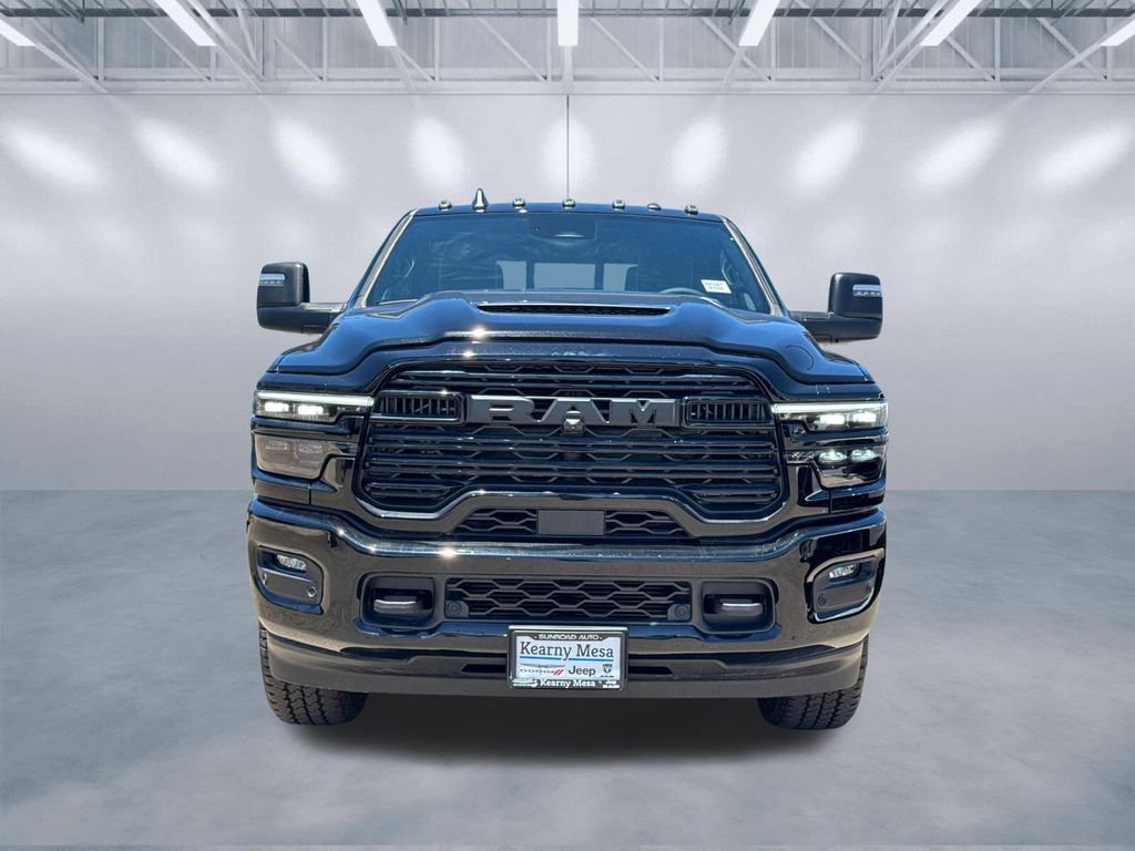New 2026 Diamond Black Crystal Pearl-Coat Exterior Paint RAM Laramie image 2