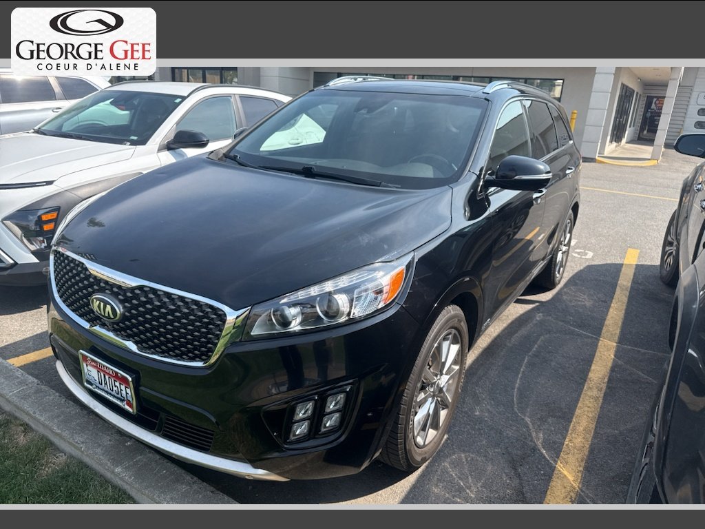Used 2016 Ebony Black Kia SXL image 1