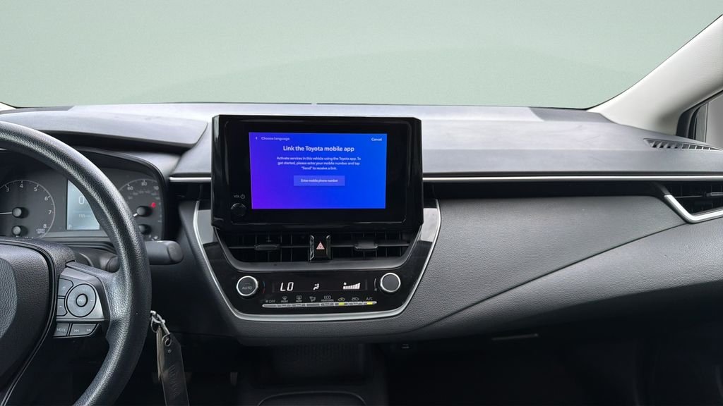Used 2024 Black Toyota LE image 19