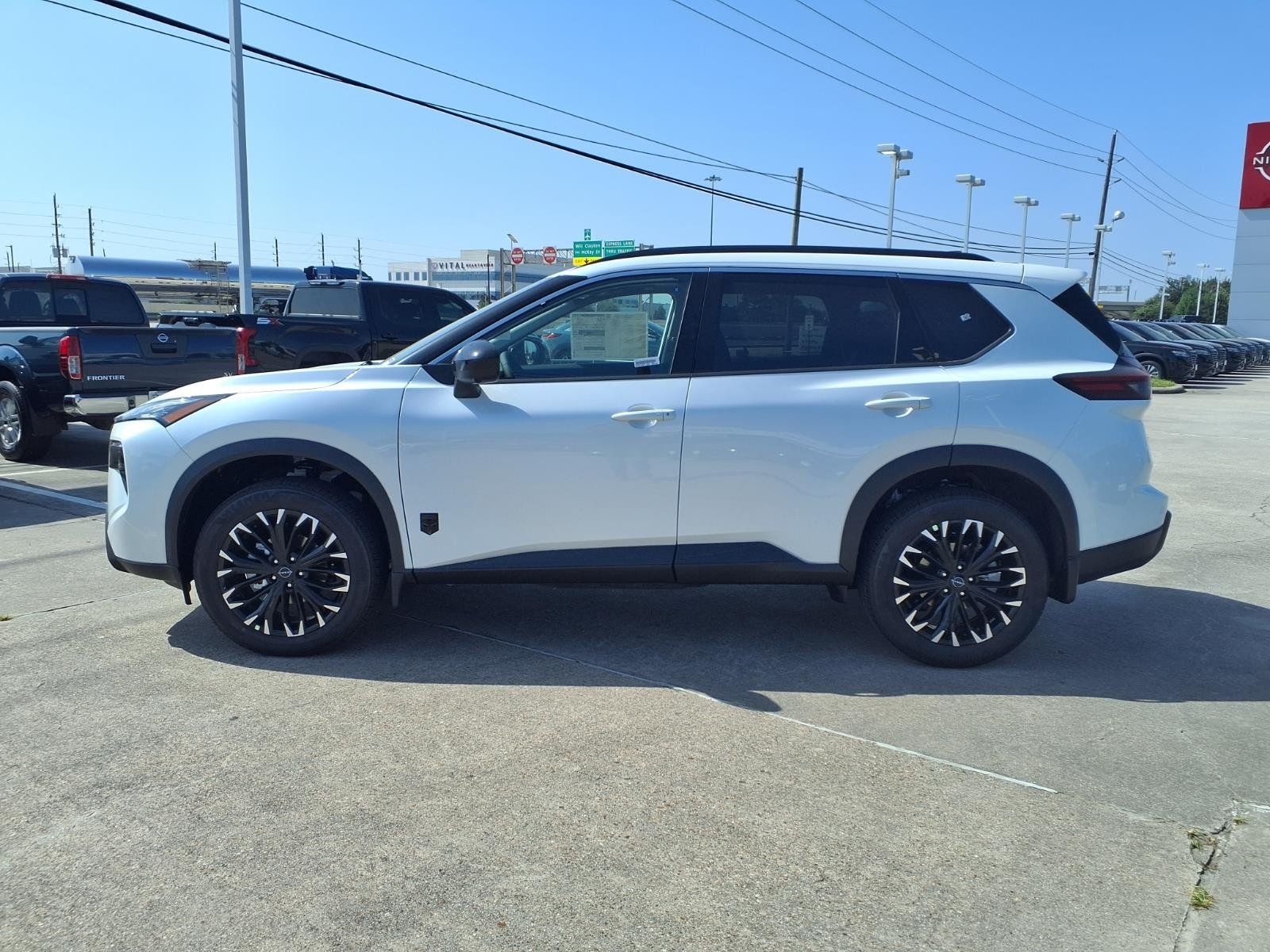 2026 Nissan Rogue Dark Armor™ White at Robbins Nissan