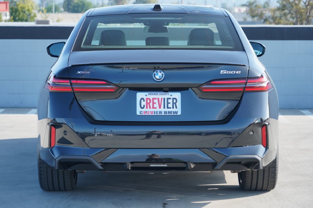 New 2027 Black Sapphire Metallic BMW 550e xDrive image 7