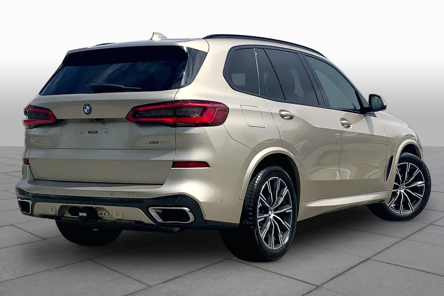 Used 2019 Sunstone Metallic BMW xDrive50i image 13
