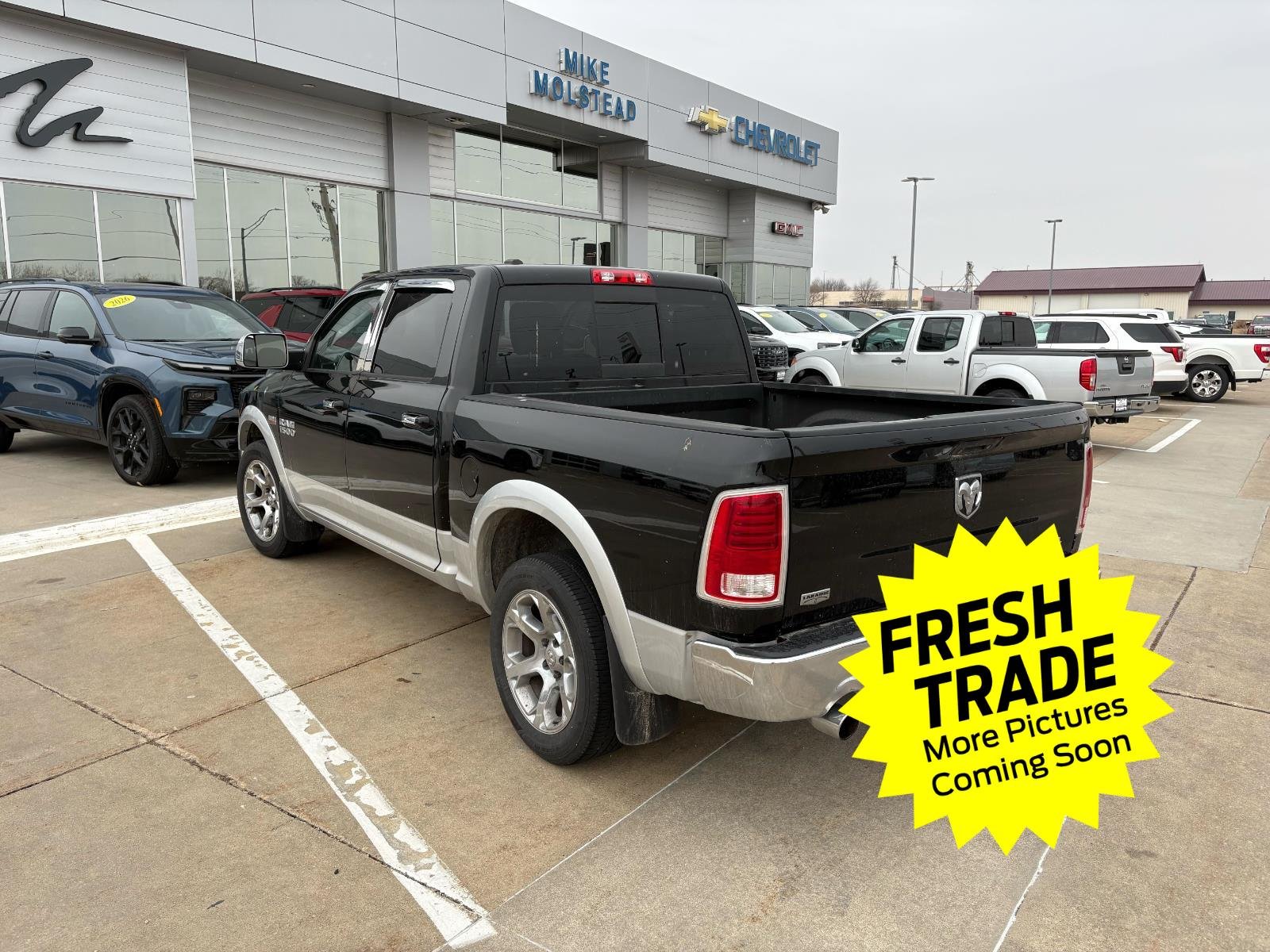Used 2013 RAM Ram 1500 Laramie with VIN 1C6RR7NT7DS515037 for sale in Charles City, IA