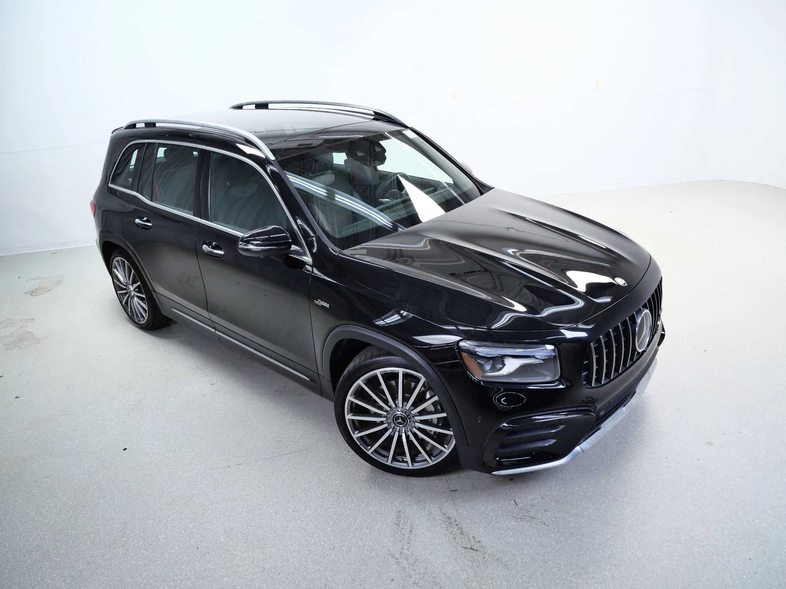 Used 2024 Cosmos Black Metallic Mercedes-Benz AMG® GLB 35 4MATIC SUV image 4