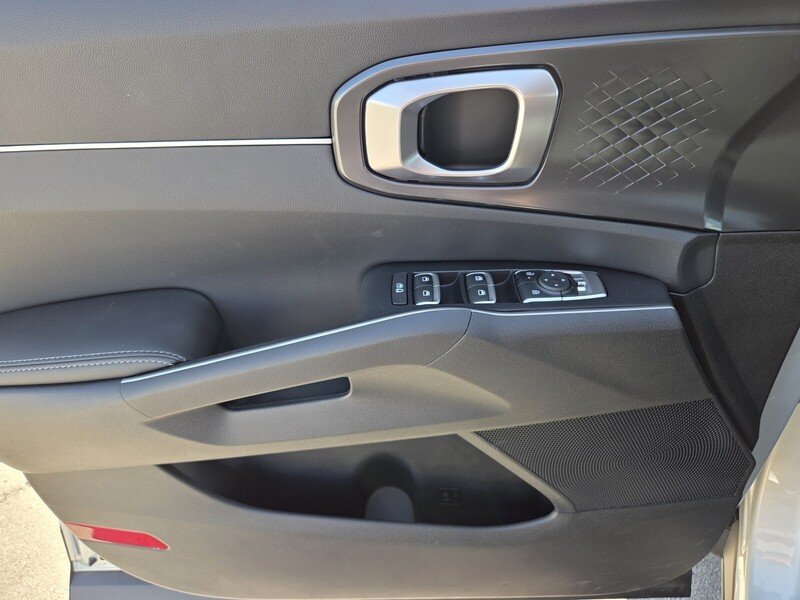 New 2026 Ivory Silver Kia LX image 9
