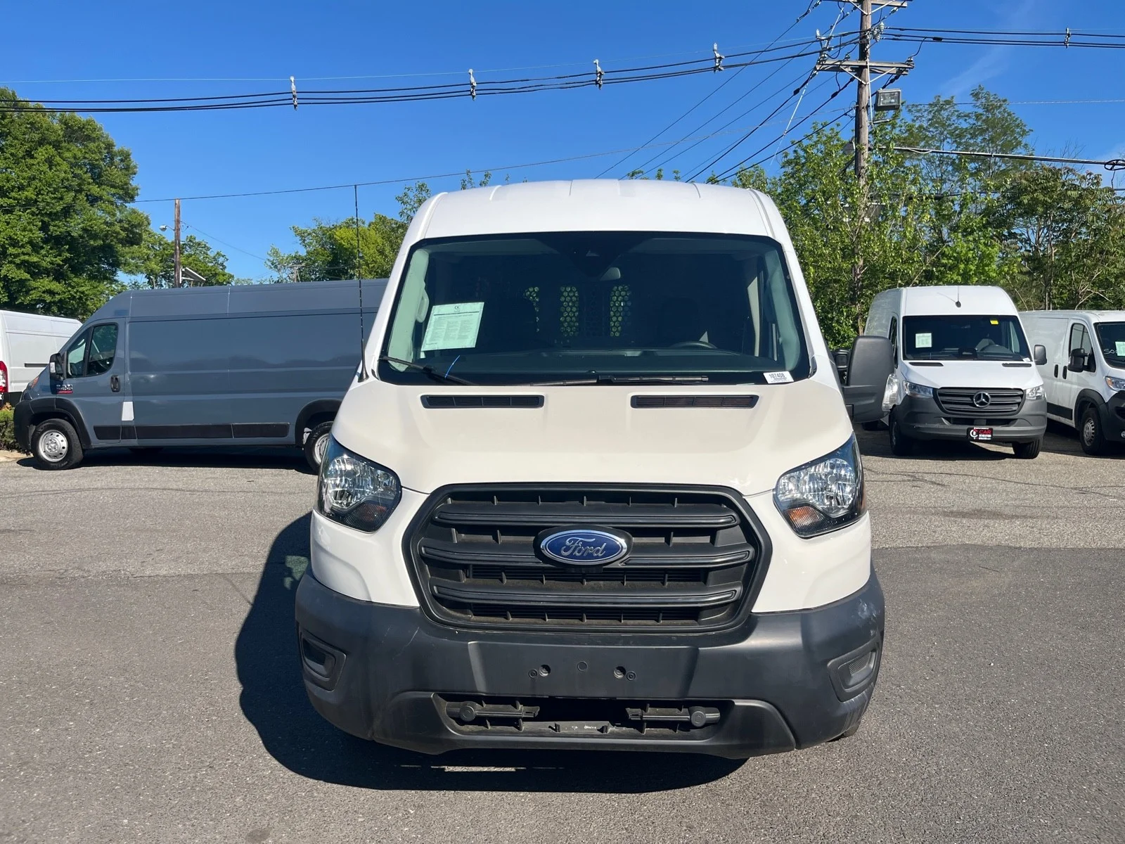Used 2023 Oxford White Ford T250 MED ROOF AWD image 2