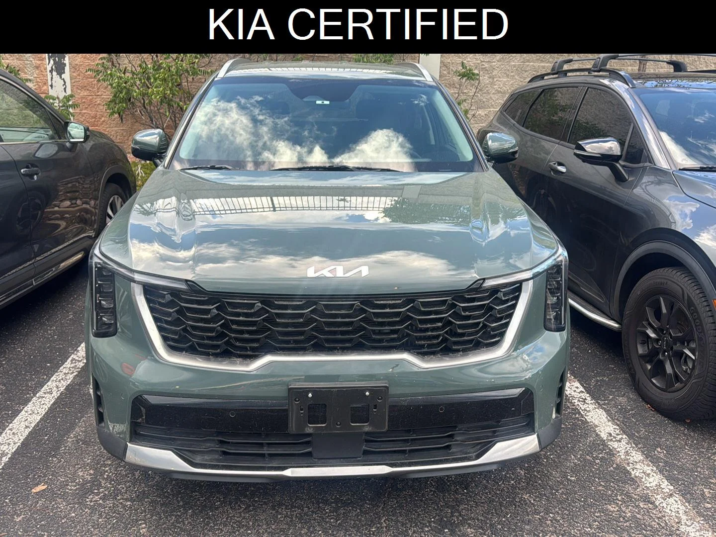 Certified Used 2025 Cityscape Green Kia EX image 1