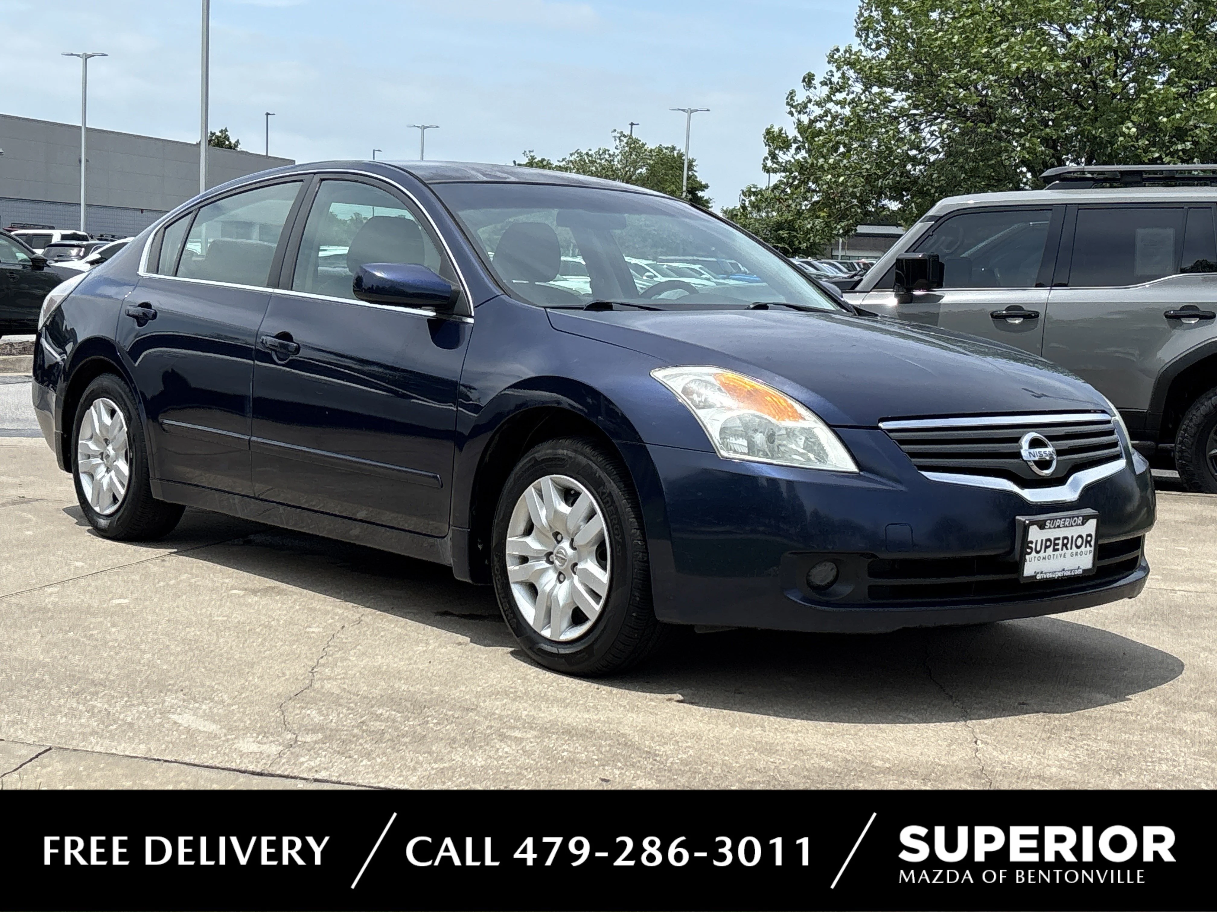 Used 2009 Navy Blue Metallic Nissan 2.5 S image 1