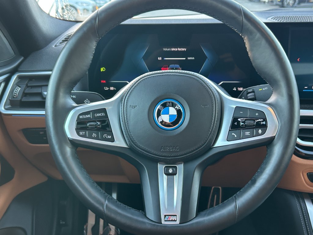 Certified Used 2024 Green Metallic BMW eDrive35 image 18