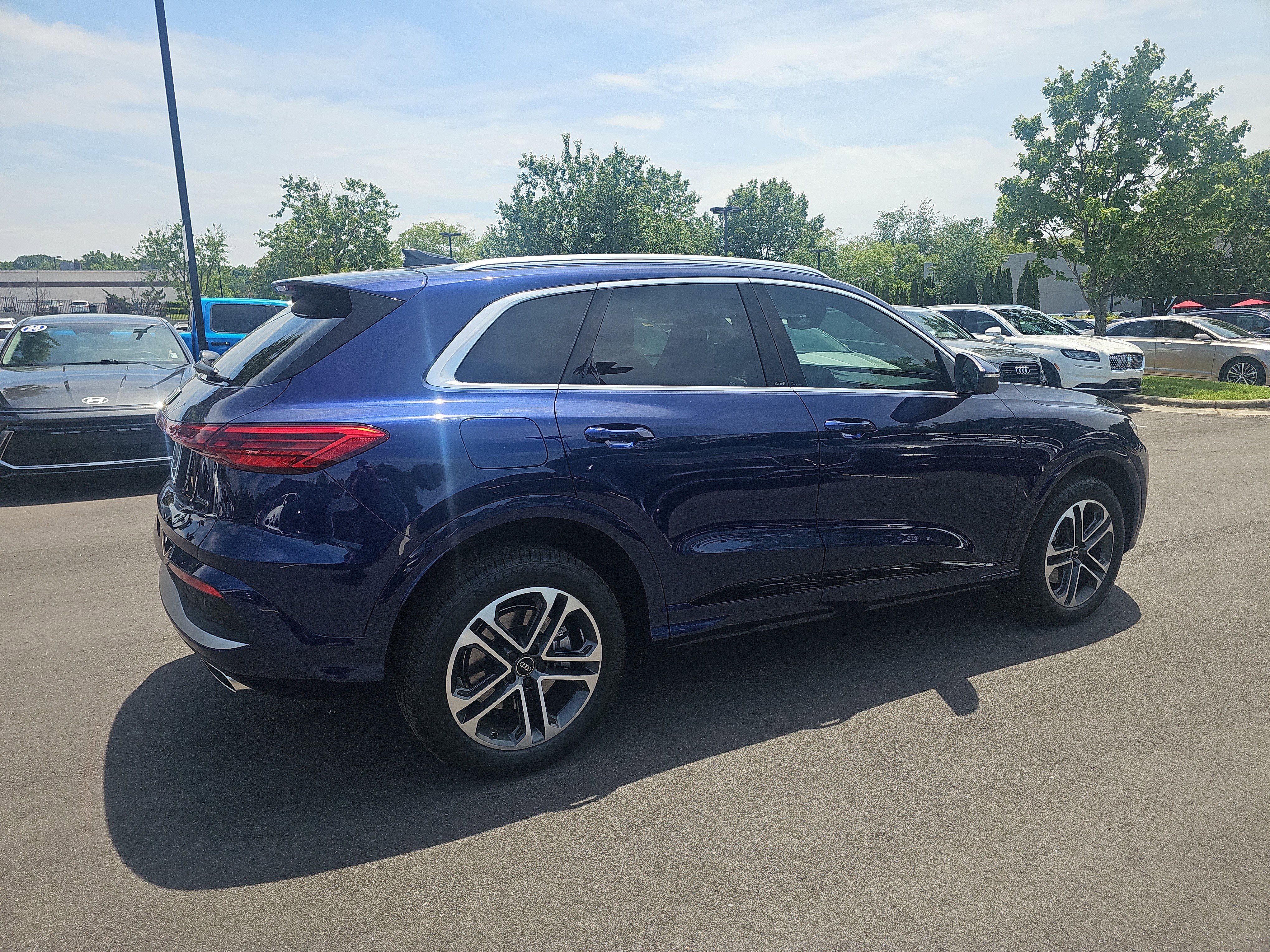 Used 2025 Navarra Blue Metallic Audi Premium Plus image 5