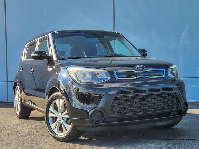 Used 2014 Black Kia Plus image 1