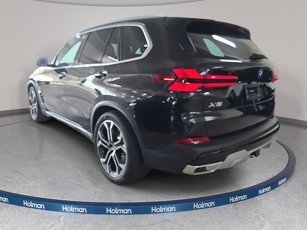 New 2026 Black Sapphire Metallic BMW xDrive50e image 7