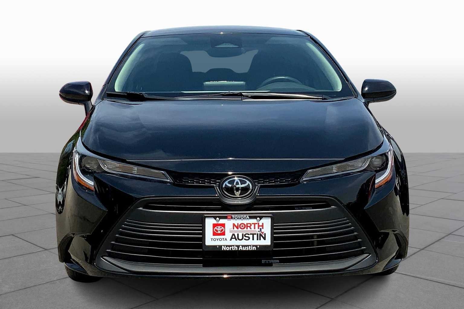 Used 2023 Midnight Black Metallic Toyota LE image 4
