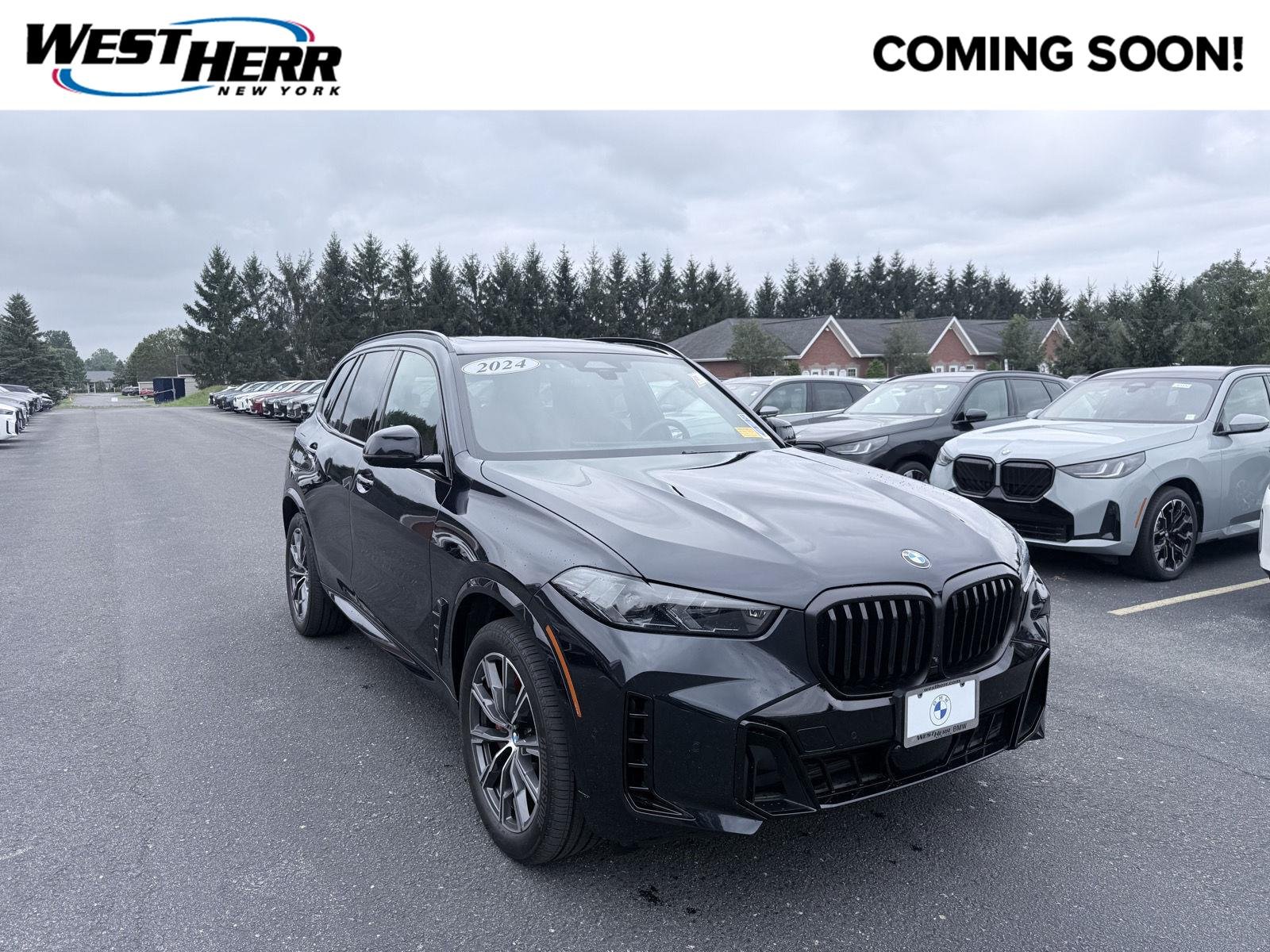Used 2024 Carbon Black Metallic BMW xDrive40i image 1