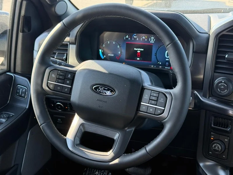 New 2026 Carbonized Gray Metallic Ford LARIAT 4WD SuperCrew 5.5