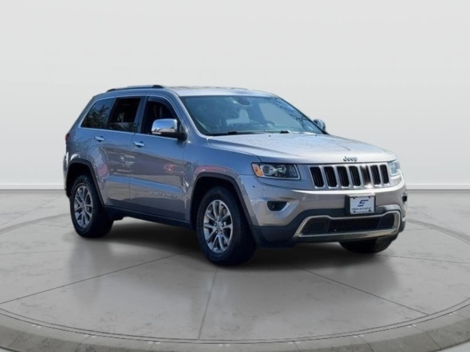 Used 2015 Silver Jeep Limited image 1