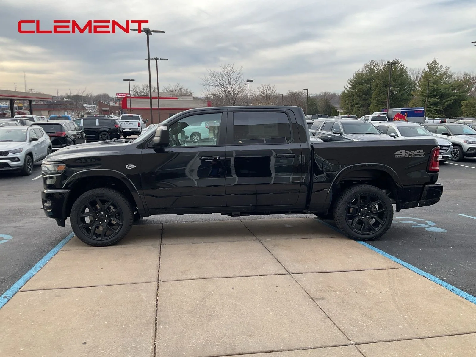 New 2026 Diamond Black Crystal Pearl-Coat Exterior Paint RAM Laramie image 2