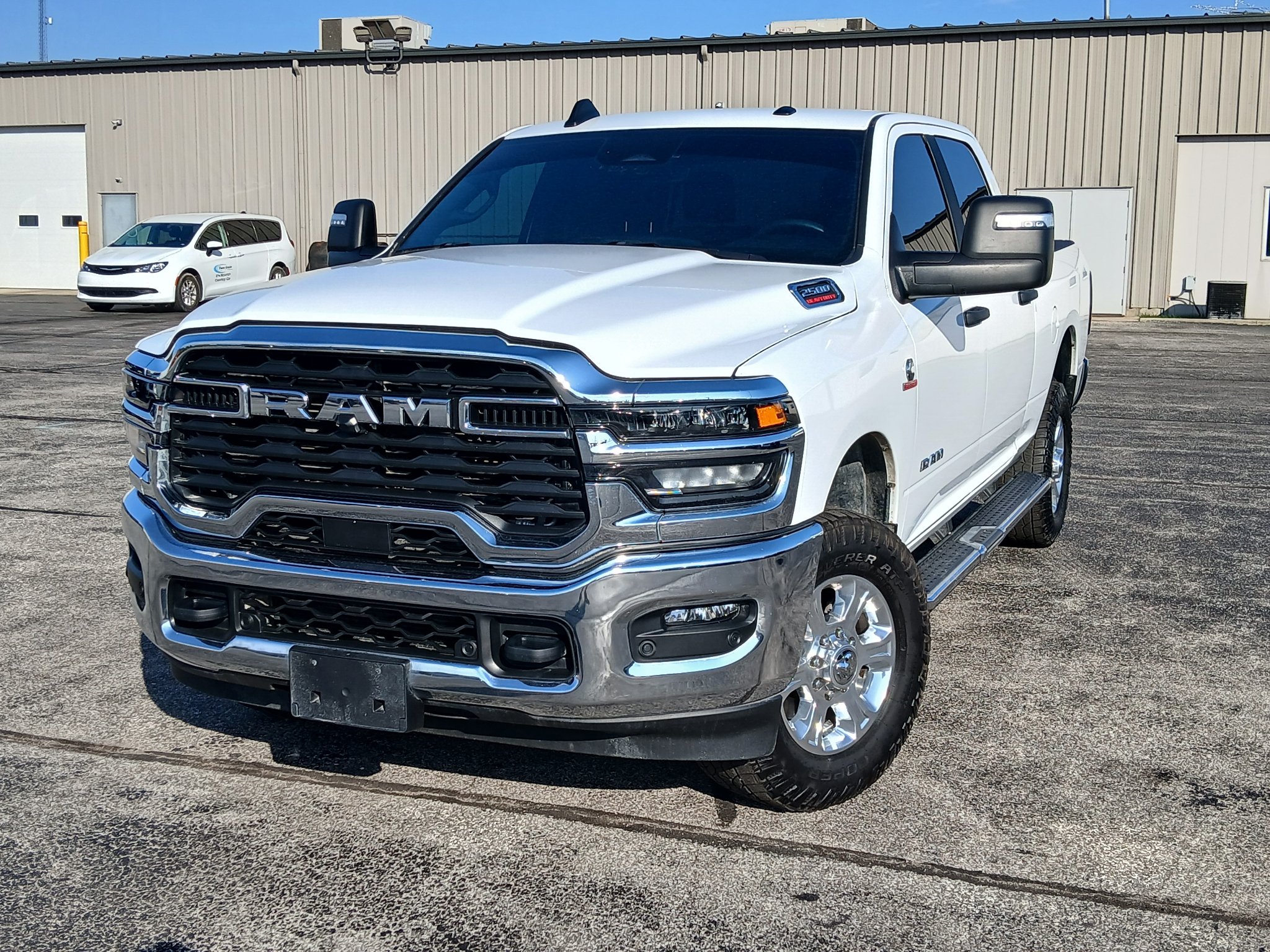Used 2025 Bright White Clearcoat Ram Big Horn image 1