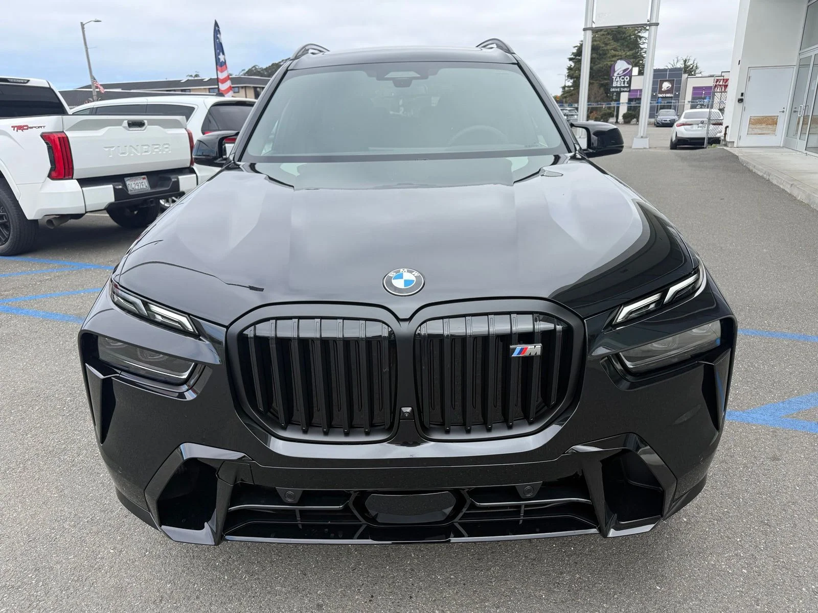 New 2027 Black Sapphire Metallic BMW M60i image 3
