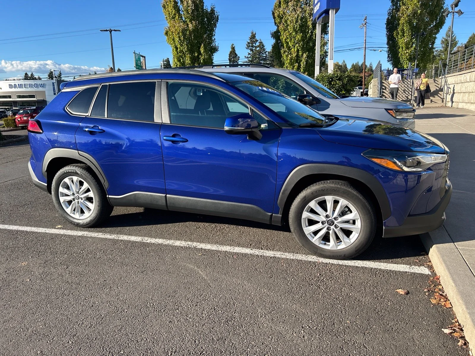 Used 2022 Blue Crush Metallic Toyota LE image 3
