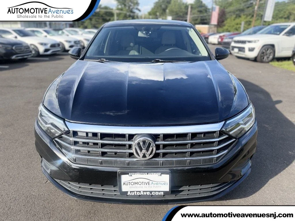 Used 2020 Black Uni Volkswagen SE Automatic image 1