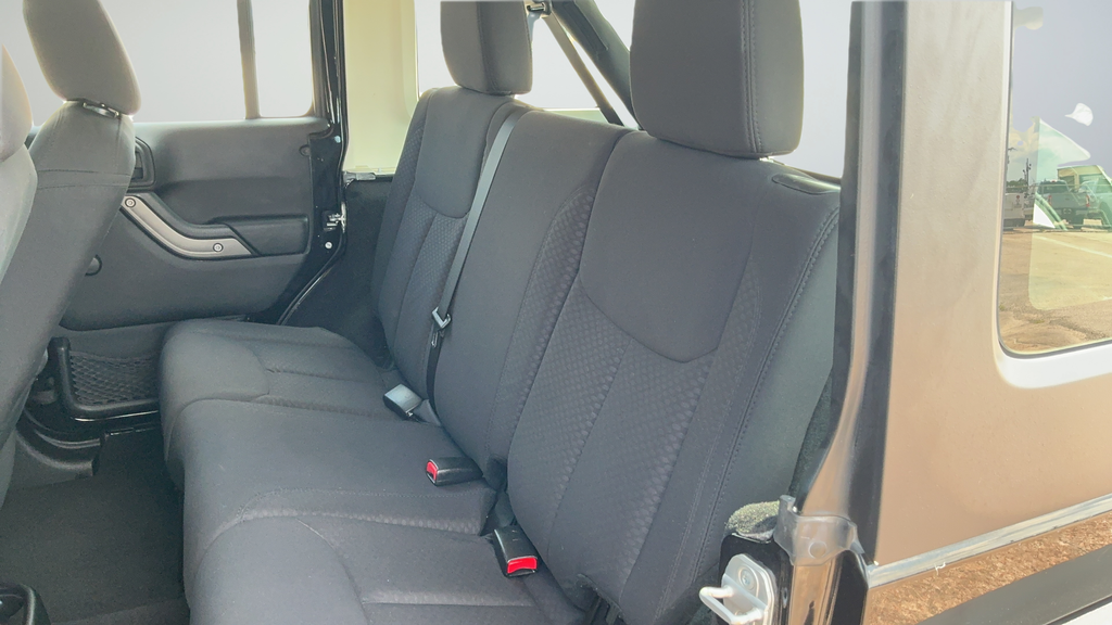 Used 2013 Black Jeep Unlimited Sport image 18