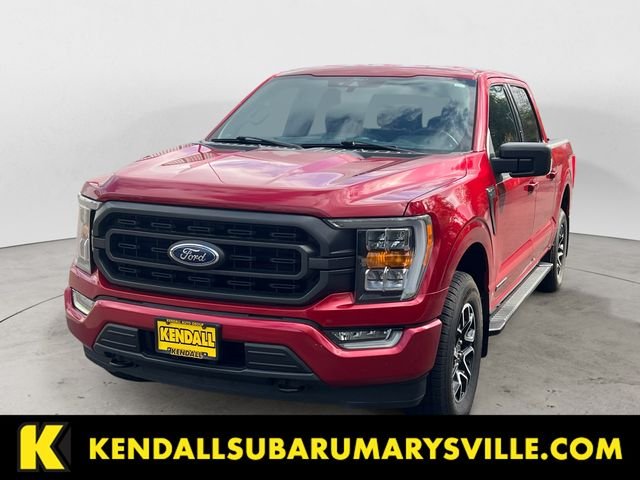 Used 2022 Rapid Red Metallic Tinted Clearcoat Ford XLT image 1