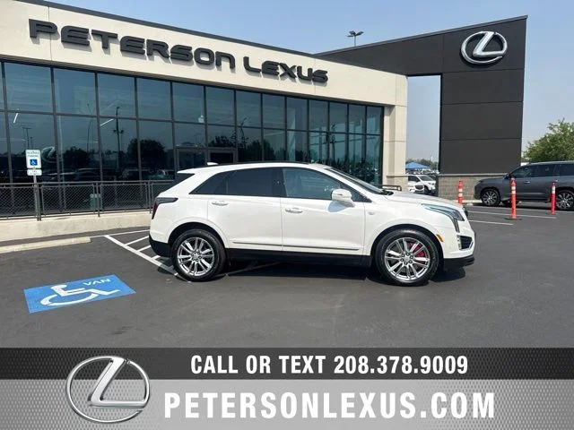 Used 2023 White Cadillac Sport image 1