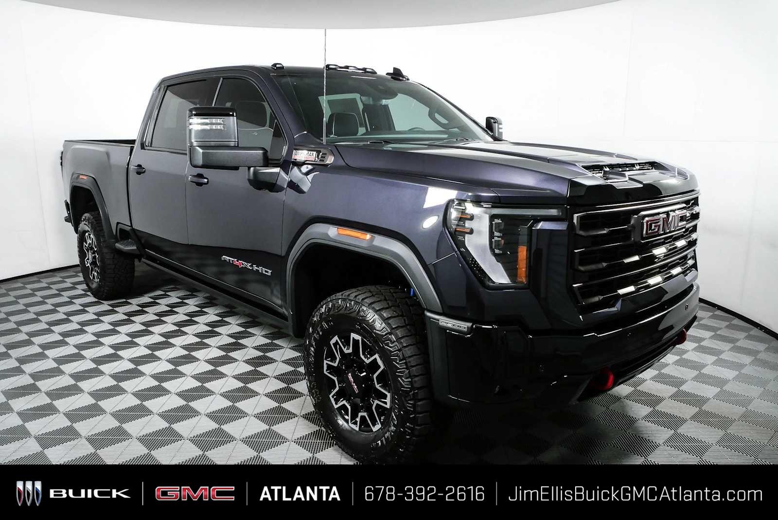 New 2026 Titanium Rush Metallic GMC AT4X image 1