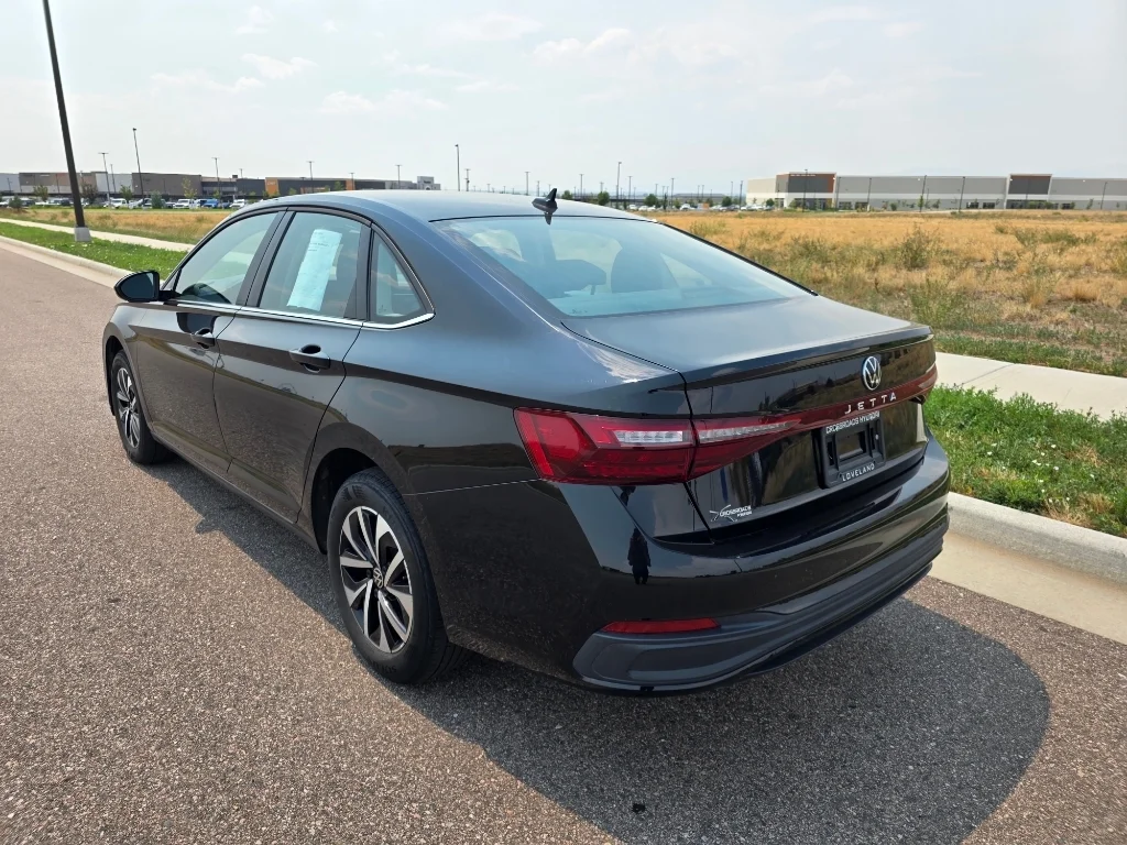 Used 2025 Deep Black Pearl Volkswagen S image 3
