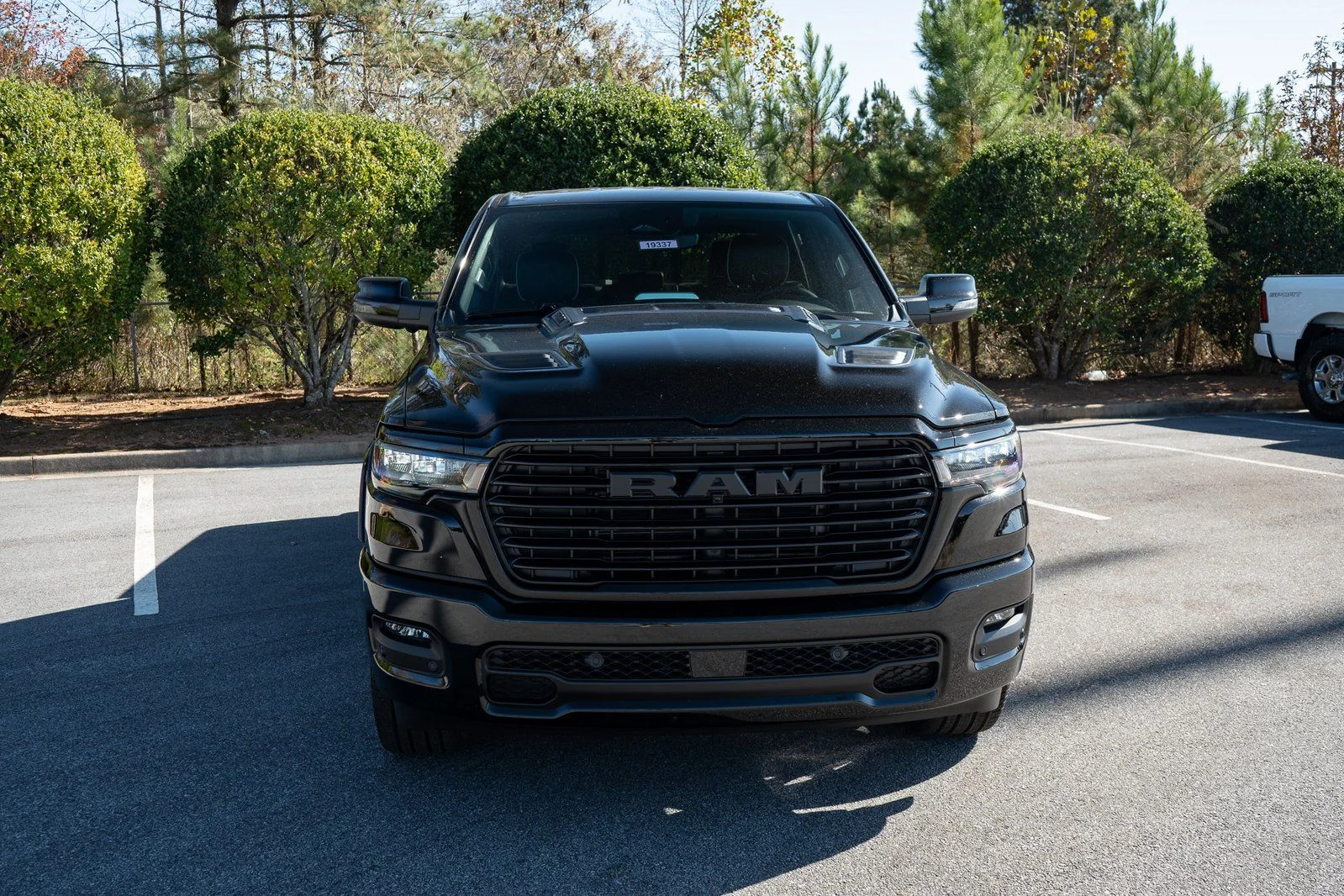 New 2026 Diamond Black Crystal Pearl-Coat Exterior Paint RAM Laramie image 2