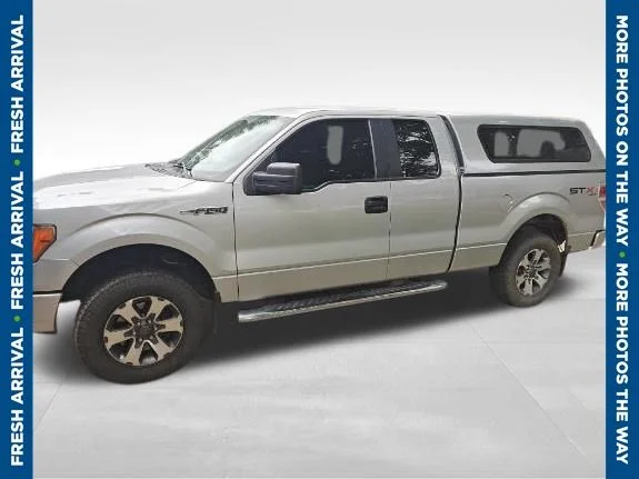 Used 2013 Silver Ford STX image 1