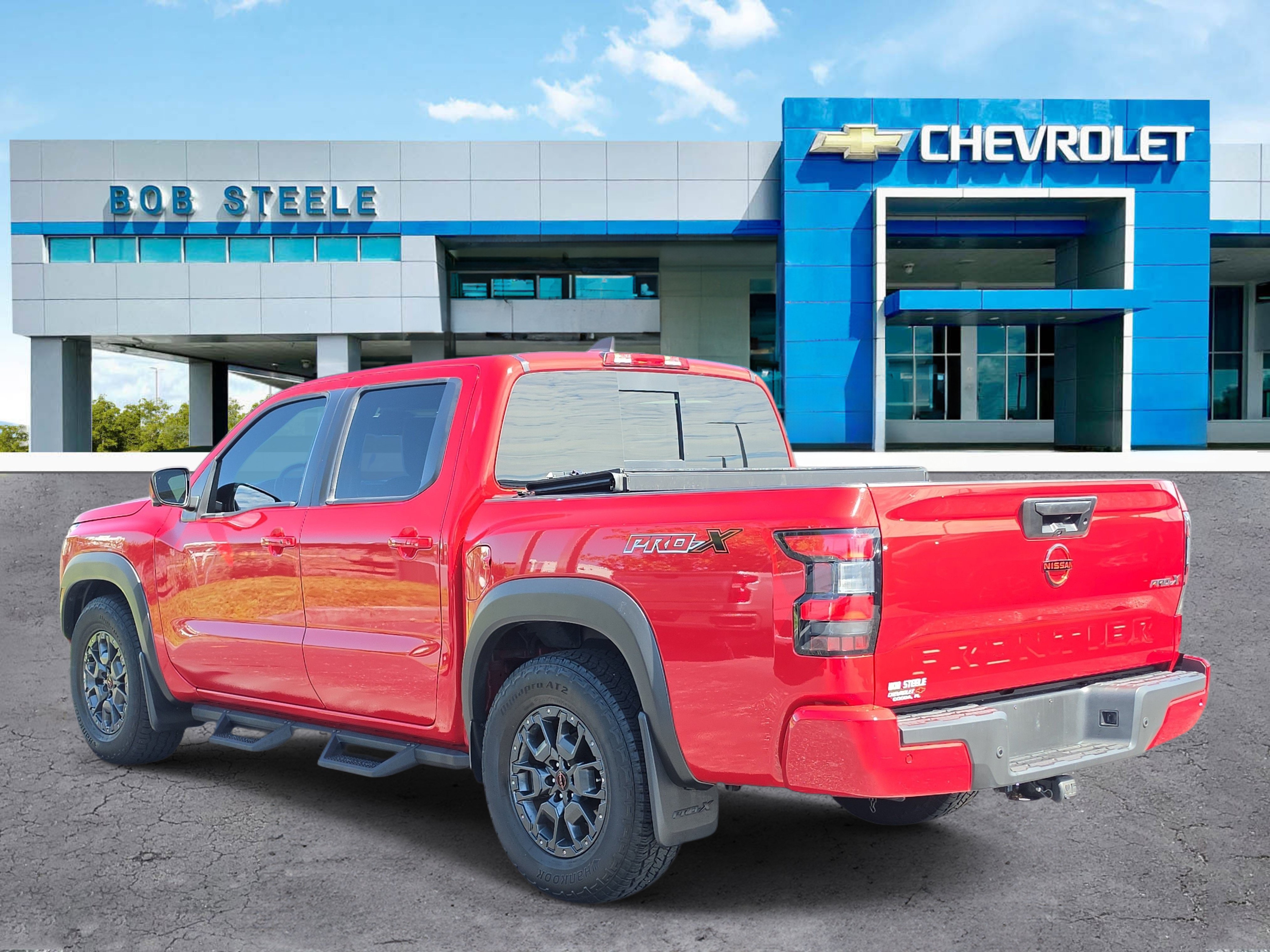 Used 2023 Red Nissan Crew Cab PRO-X 4x2 image 4