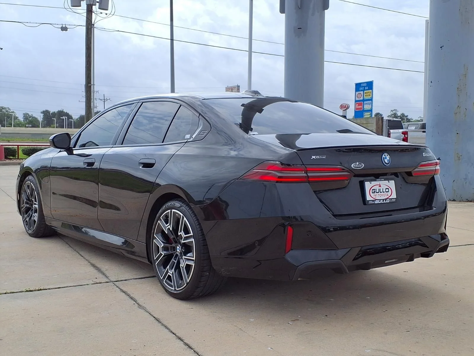 Used 2026 Black BMW 550e xDrive image 2
