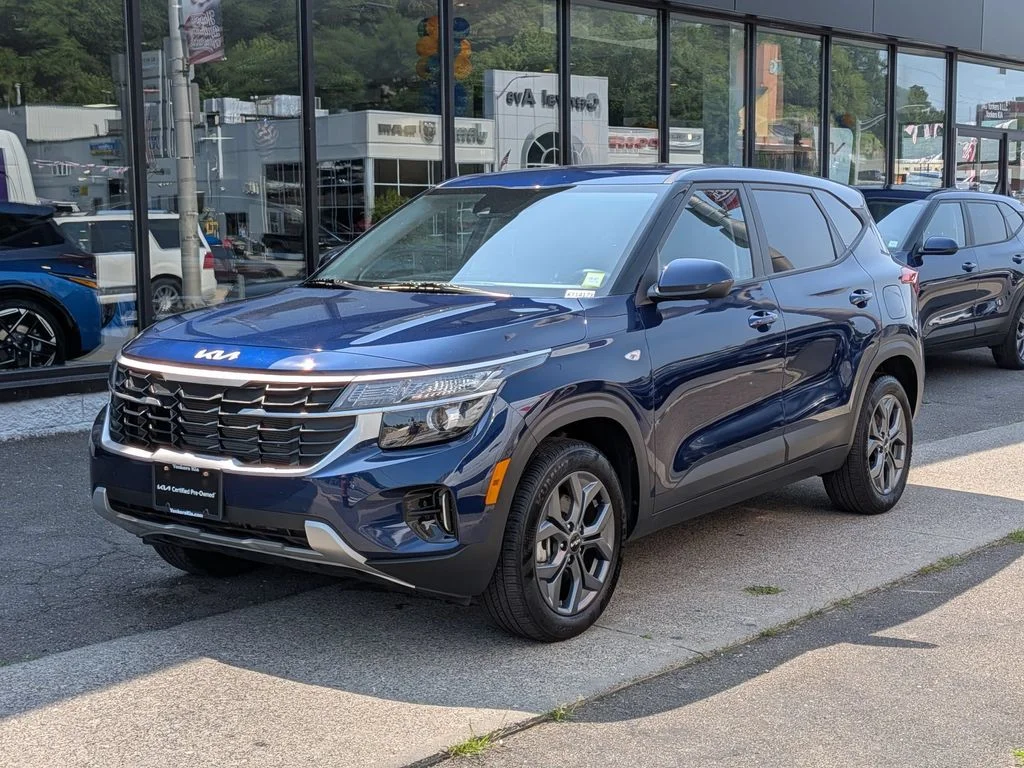 Used 2025 Blue Kia LX image 1