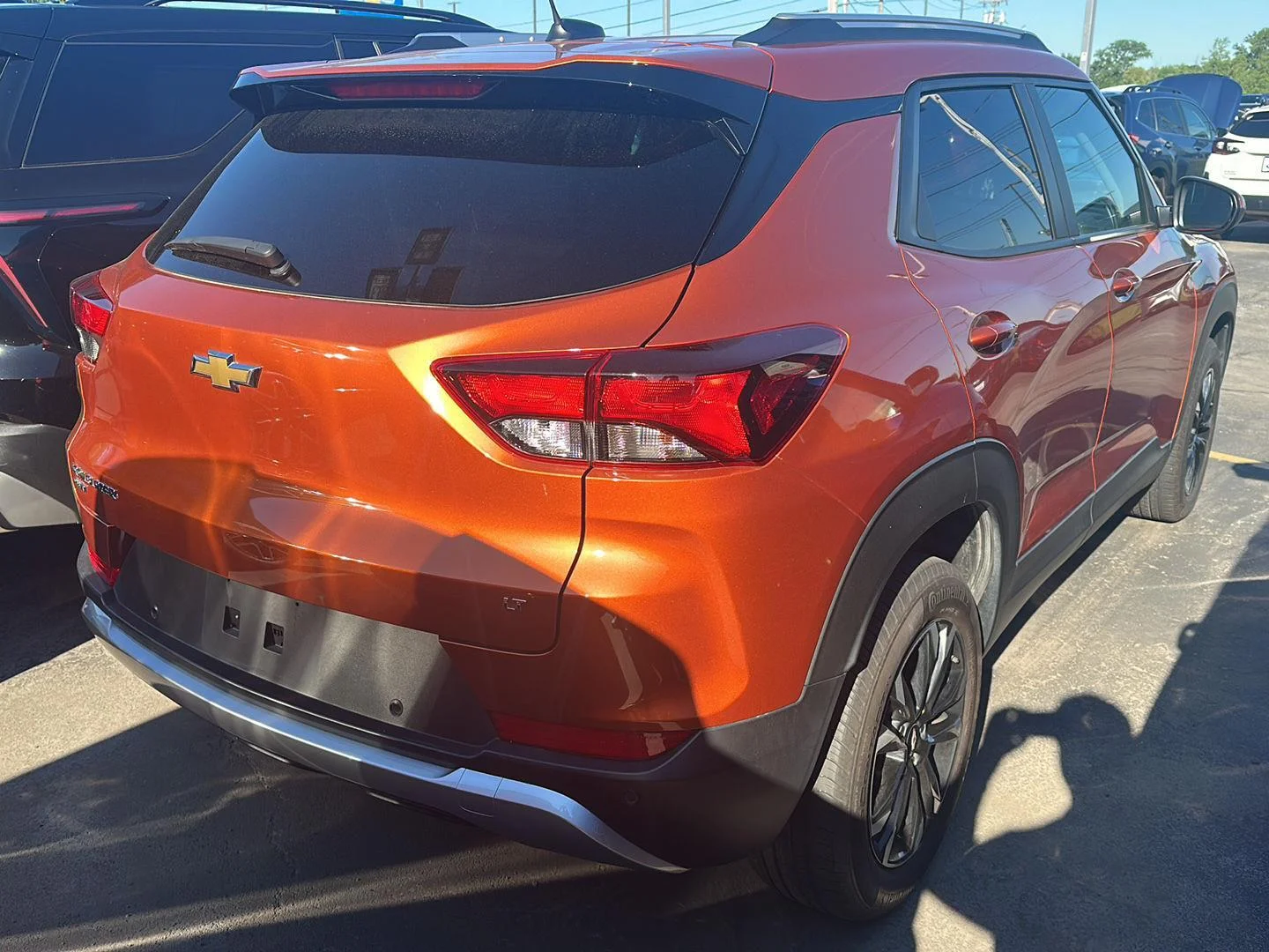 Used 2023 Vivid Orange Metallic Chevrolet LT image 2