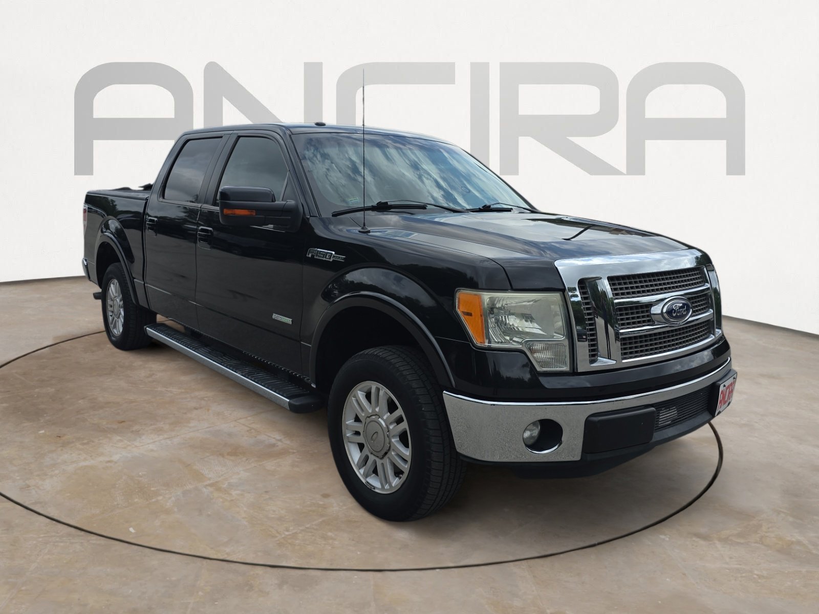 Used 2011 Tuxedo Black Metallic Ford Lariat image 4