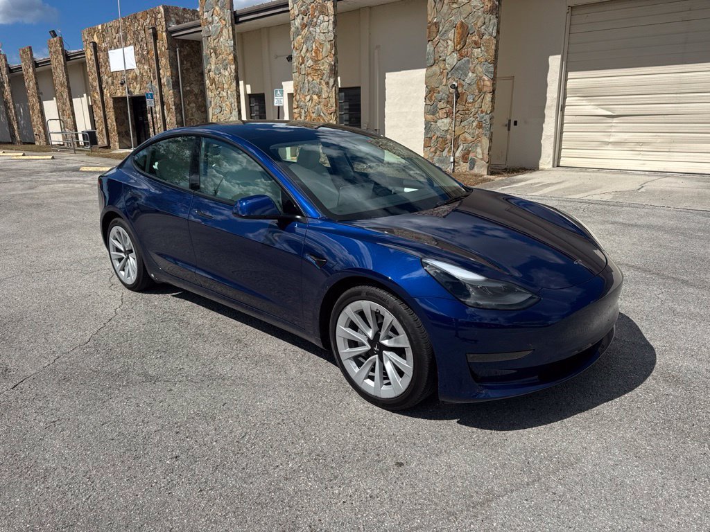 Used 2023 Deep Blue Metallic Tesla Base image 1