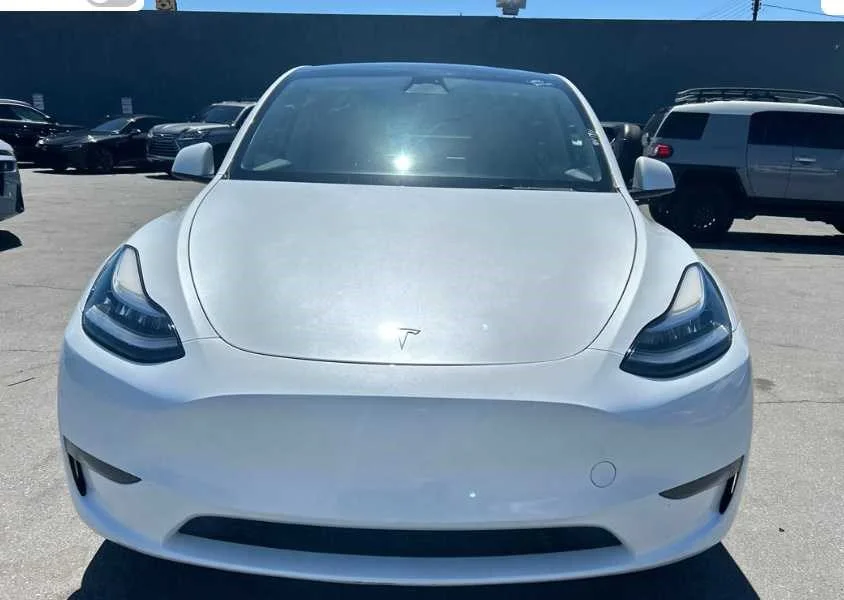 Used 2023 Tesla Model Y Long Range with VIN 7SAYGDEE2PA043387 for sale in Brooklyn Park, MN