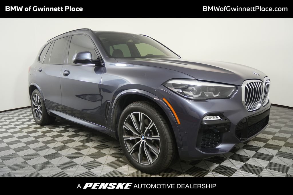 Used 2019 Gray Metallic BMW xDrive40i image 1