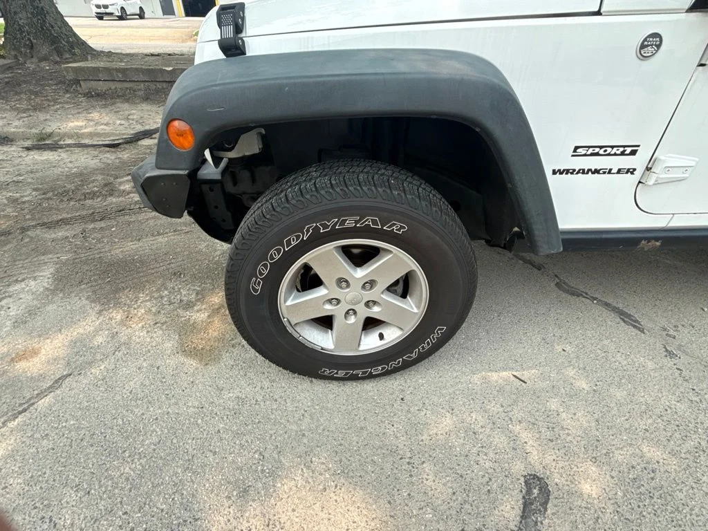 Used 2013 White Jeep Sport image 1