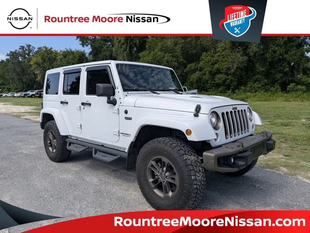 Used 2017 White Jeep Unlimited Sahara image 1