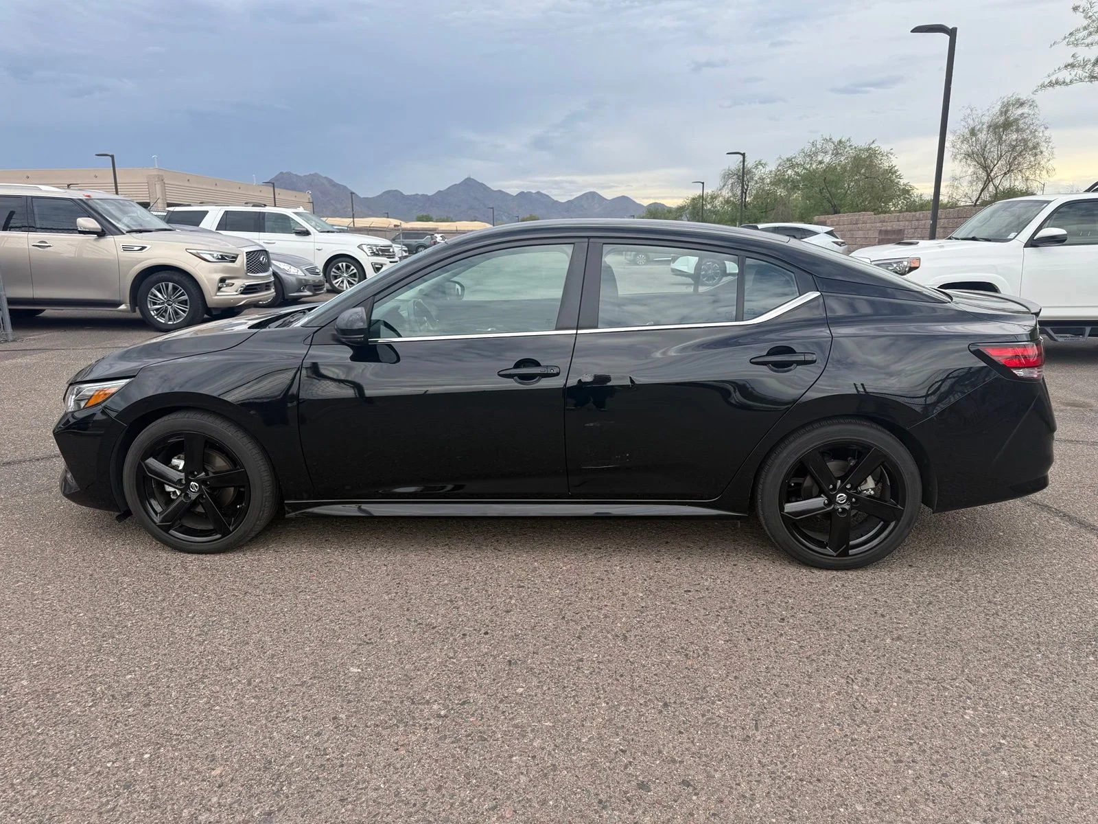 Used 2023 Super Black Nissan SR image 7
