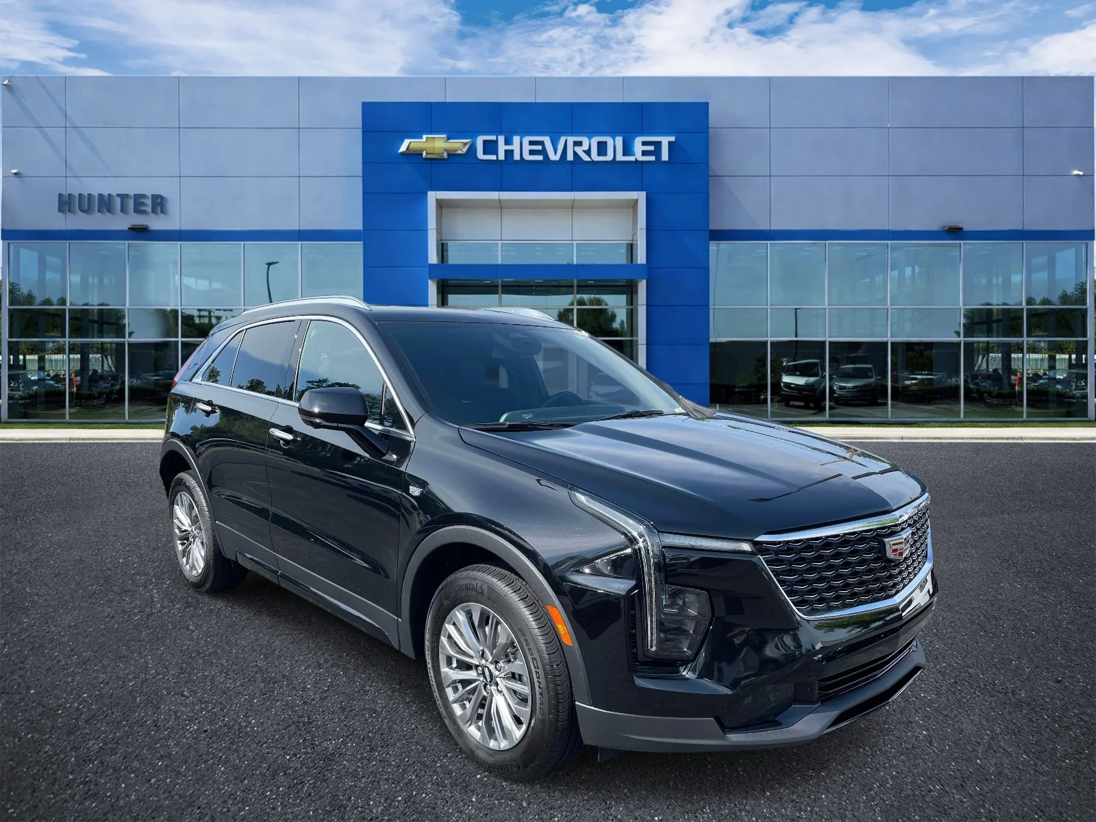 Used 2025 Stellar Black Metallic Cadillac Premium Luxury image 1