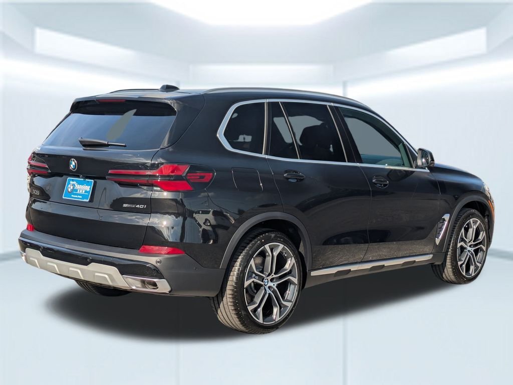 New 2026 Black Sapphire Metallic BMW sDrive40i image 5