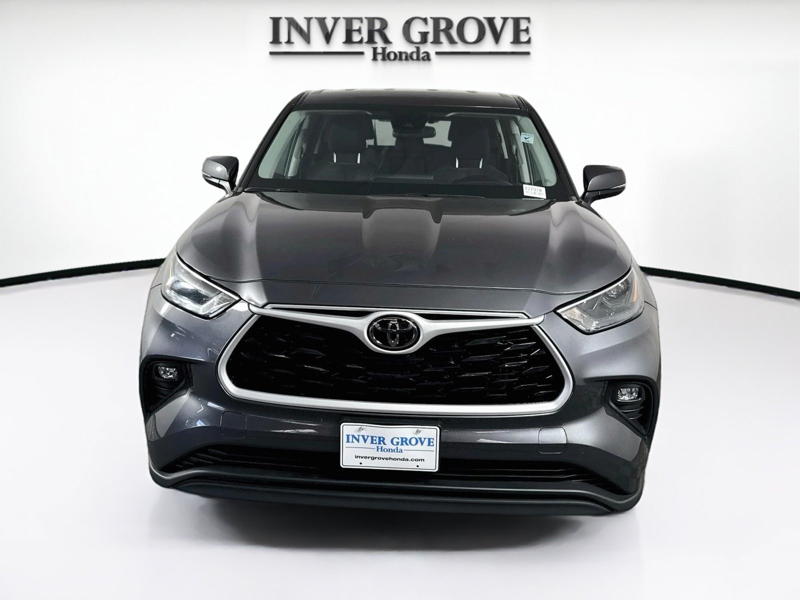 Used 2023 Toyota Highlander LE with VIN 5TDKDRBHXPS009235 for sale in Inver Grove Heights, Minnesota