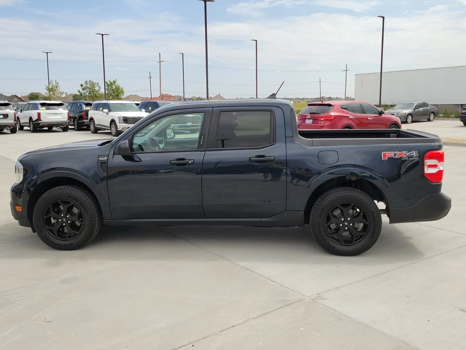 Used 2022 Blue Ford XLT All-Wheel Drive Supercrew 4.5 ft. box 121.1 in image 2