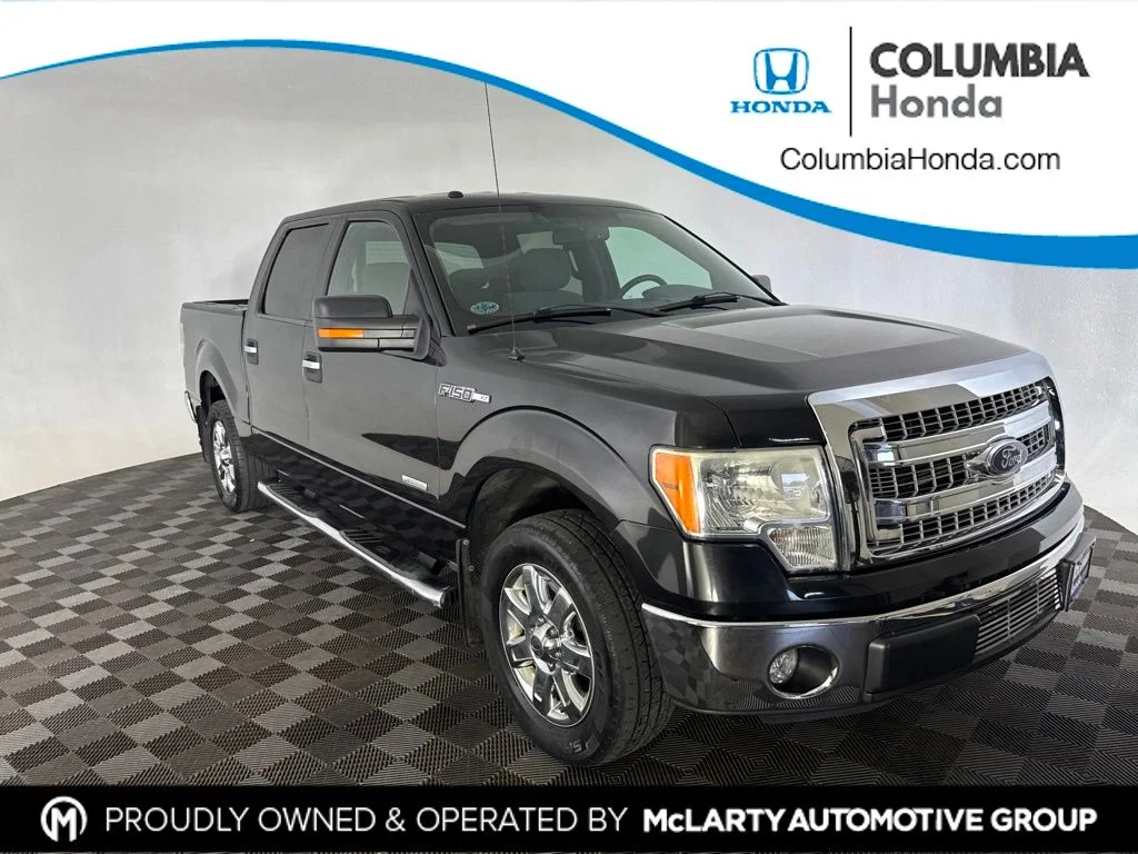 Used 2014 Black Ford XLT image 1