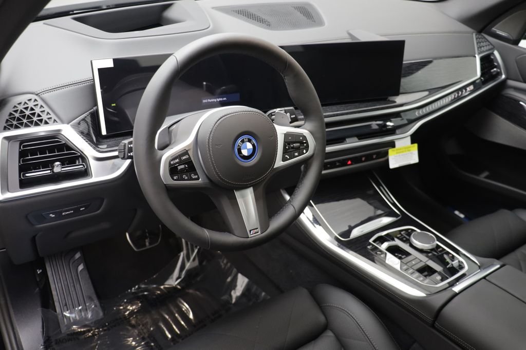 New 2026 Black Sapphire Metallic BMW xDrive50e image 8
