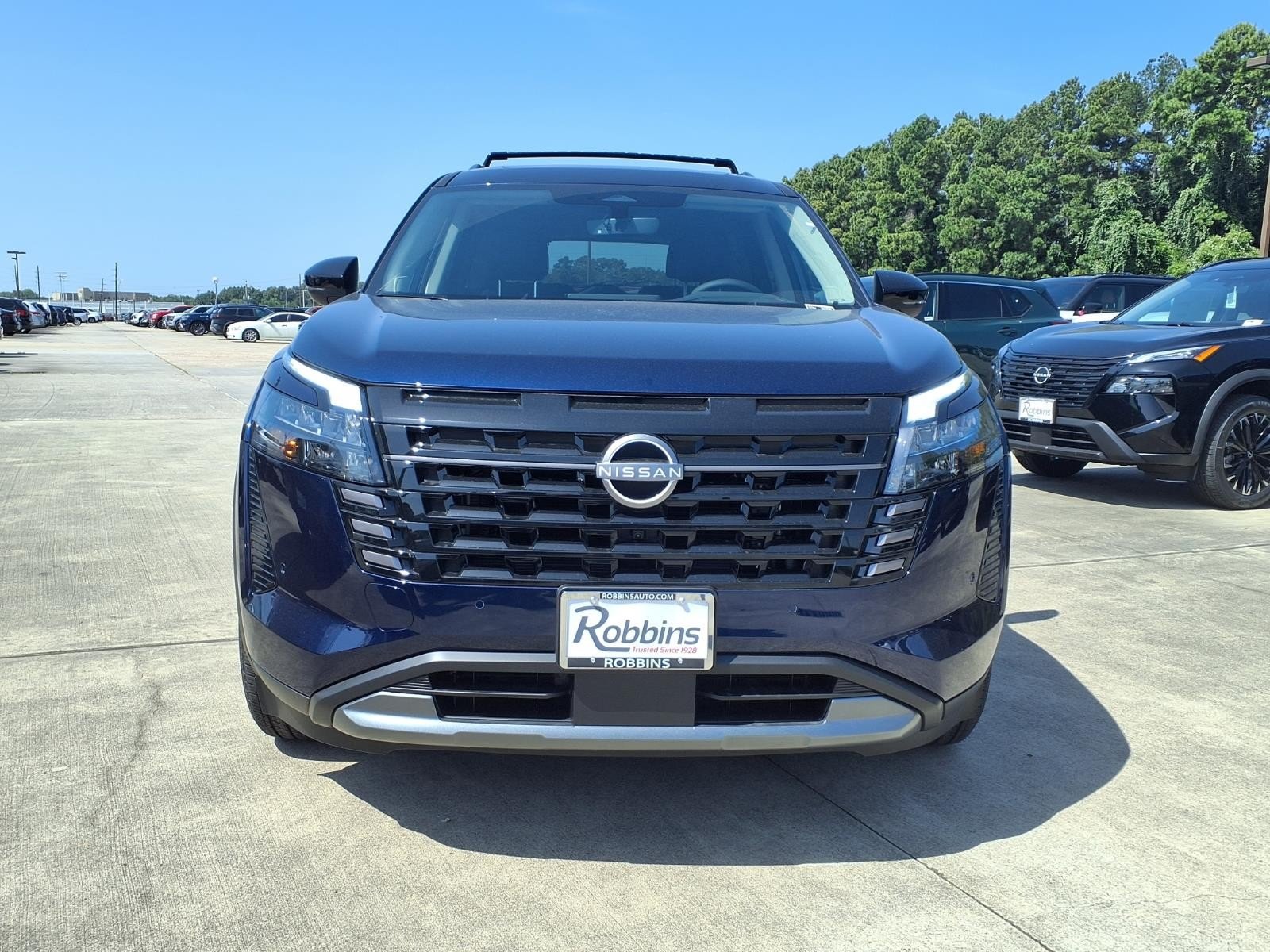 New 2026 Deep Ocean Blue Pearl Nissan SL image 2